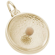The Mustard Seed / 14K Yellow Gold Charm by Rembrandt Charms features a gold round pendant with a textured concave surface, highlighted by a small, smooth beige sphere in the center. Crafted from 14K Yellow Gold, this elegant piece comes with a loop at the top for easy attachment to any chain or necklace.