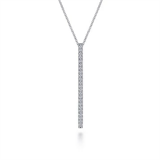 The 14K White Gold Diamond Bar Pendant Necklace by Gabriel & Co features a delicate design with a long, slender vertical pendant adorned with small, sparkling diamonds. Hanging from a fine chain, this exquisite piece is part of the elegant and minimalist Lusso Collection.