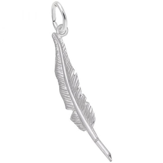 A close-up of the Feather Pen Charm by Rembrandt Charms reveals a sterling silver feather pendant with exquisite detailing, featuring intricate lines that mimic the texture of a real feather. This charm includes a small loop at the top, perfect for attaching to a chain or bracelet. The background is plain white.