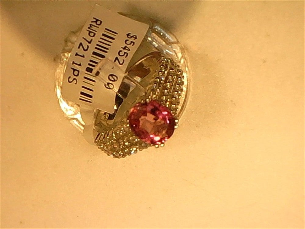A Ryan Gems 14k white gold ring, size 7, features an oval pink sapphire and triple diamond band. Price: $5,452.00. Code: RWP721PTS. Displayed on a light background.
