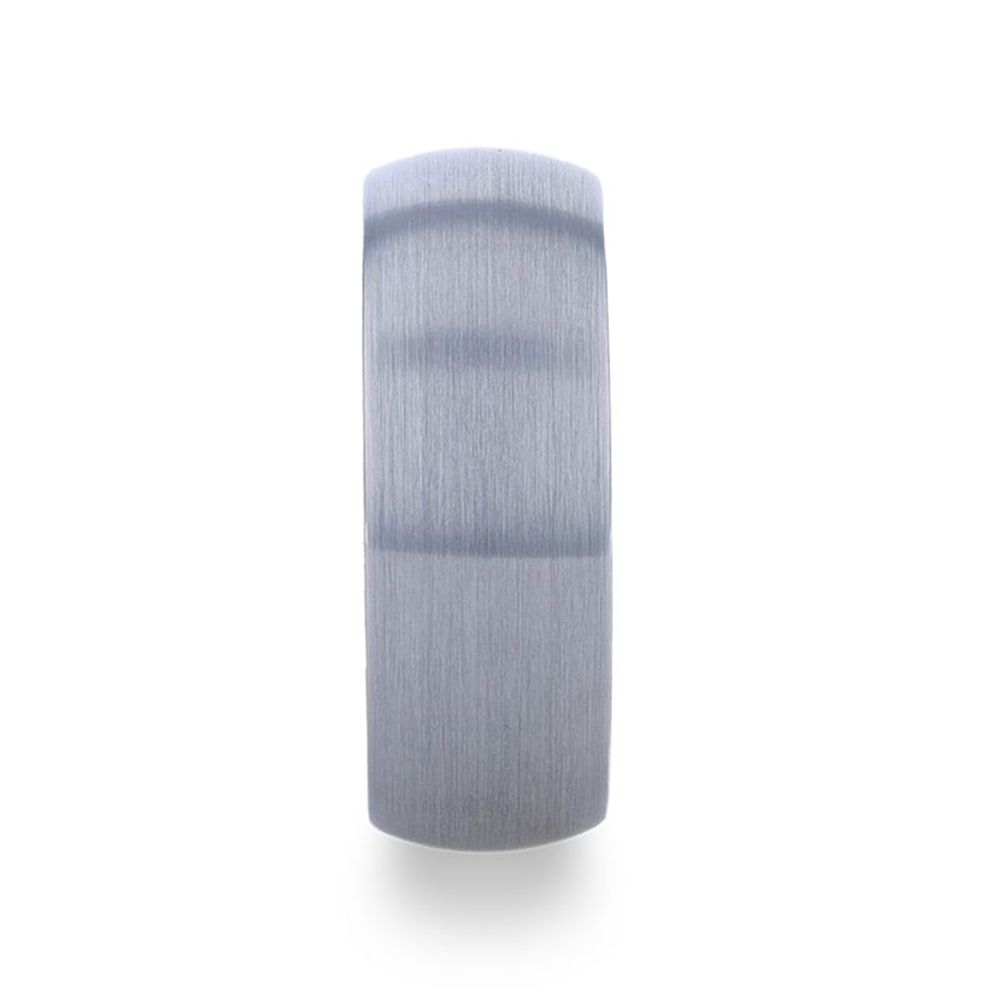 A simple, matte-finished, 8mm cylindrical silver ring with a smooth texture and clean lines, the CAMERON Domed Brushed Finish Tungsten Carbide Men's Wedding Band by Thorsten features rose gold ion plating. Positioned vertically with its flat band facing upward, this minimalist design is ideal for men seeking a modern wedding band.