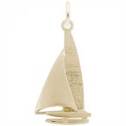 Rembrandt Charms' Catamaran Charm in gold-plated sterling silver features a detailed sail and hull with textured and smooth surfaces, plus a top loop for easy attachment to jewelry—perfect for standout nautical style.
