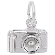 A Rembrandt Charms Camera Charm / Sterling Silver, featuring intricate details like a lens, flash, and viewfinder. The charm has a rounded loop at the top for attaching to a bracelet or necklace.