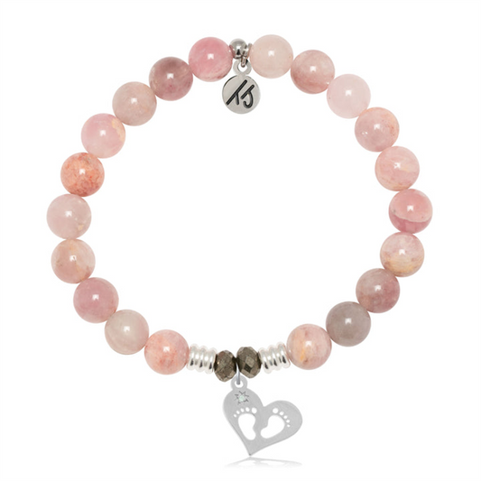 The T Jazelle Madagascar Quartz Gemstone Bracelet features pink beads, silver accents, and a sterling silver charm with baby feet and a round "TS" tag.