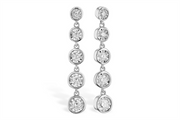Discover the sophistication of the Diamond 14K White Gold Dangle Earrings by Allison Kaufman. These exquisite earrings showcase a series of five round, bezel-set gemstones, artfully linked to create a sleek and modern vertical design.