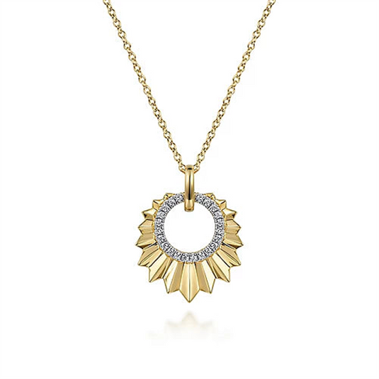 The Gabriel & Co 14K Yellow Gold Diamond and Diamond Cut Texture Pendant Necklace boasts a luxurious sunburst design. The circular pendant, adorned with an inner ring of sparkling diamonds, radiates golden rays, making it a truly stunning piece.