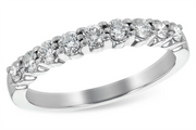 The Allison Kaufman 14k white gold band showcases a row of prong-set natural diamonds totaling 0.50ct, creating a timelessly elegant wedding ring.