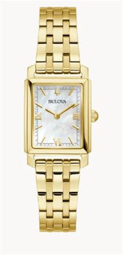 The Bulova Sutton 97L177 ladies watch features a gold tone rectangular case, MOP face, gold hour markers, Roman numerals at 6 and 12 o’clock, and a matching gold link bracelet.