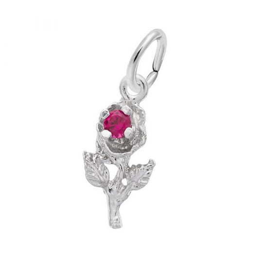 The Rose with Stone Charm by Rembrandt Charms is a sterling silver pendant intricately shaped like a rose, featuring detailed petals and leaves. At the center of the rose is a vivid red gemstone. This charming piece includes a loop at the top for easy attachment to a chain or bracelet.