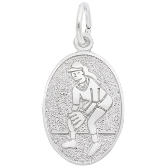 The Softball Oval Disc Charm in Sterling Silver by Rembrandt Charms features an engraving of a female baseball player in a crouching position, wearing a cap and holding a glove, ready to catch the ball. With its textured background and loop for attaching to a chain, this charm is truly unique.