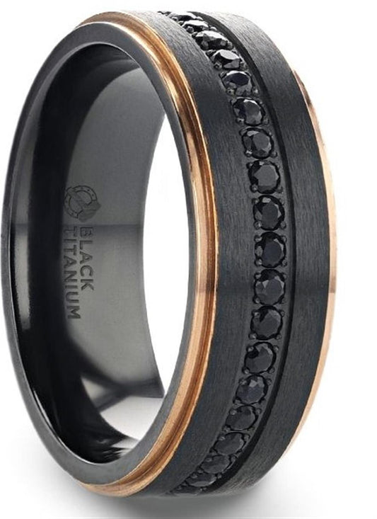 A sleek black titanium ring by Thorsten with a brushed finish, featuring a rose gold plated edge and a row of small black sapphires in a channel setting around the circumference. The interior is inscribed with "BLACK TITANIUM".