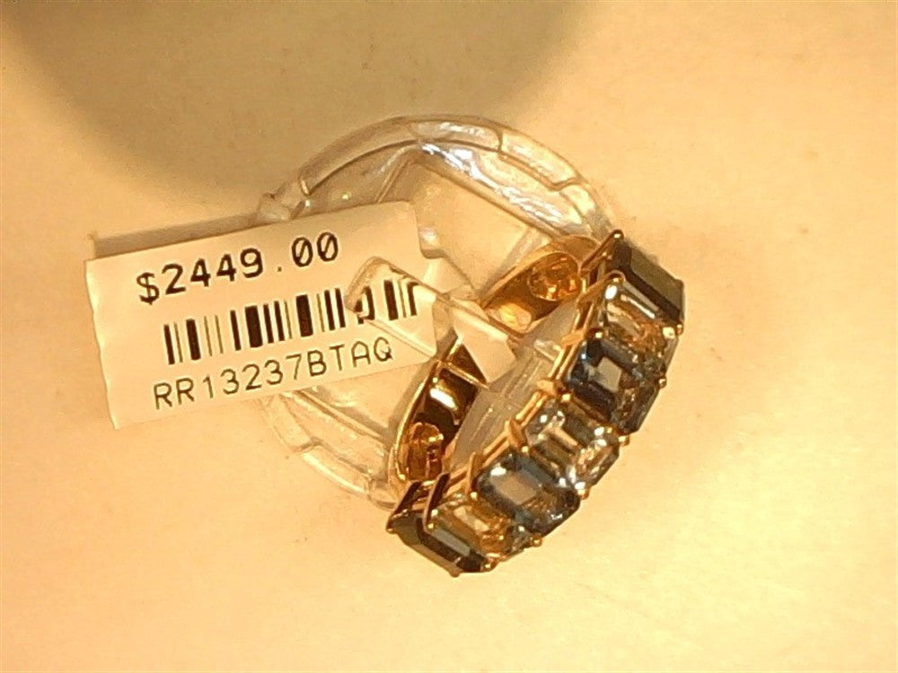 A 14k rose gold ring by Ryan Gems, size 6.75, featuring London Blue Topaz and Aquamarine stones, is shown with a $2449.00 price tag and a barcode.