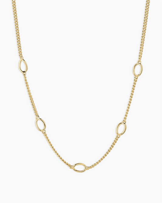 The Gorjana Wilder Link Necklace is an 18k gold plated charm necklace with evenly spaced oval open links, shown against a plain white background.