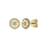 A pair of 14K White and Yellow Gold Diamond Stud Earrings with circular designs. Each earring features a central diamond surrounded by a decorative, textured pattern that resembles petals or sun rays. The backing is engraved with the brand name "Gabriel & Co.