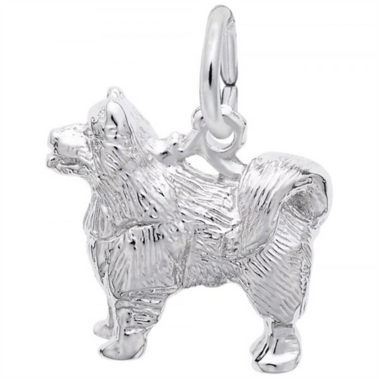 The Rembrandt Charms sterling silver "Samoyed" charm showcases a fluffy Samoyed with detailed fur, a curly tail, and upright ears. It includes a hoop for easy bracelet or necklace attachment.