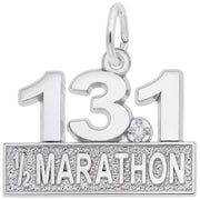 The Marathon 13.1 W/White Spinel Charm by Rembrandt Charms features a sterling silver pendant with the number "13.1" on top of a rectangular plate inscribed with "1/2 MARATHON," accentuated by a small white spinel gem.