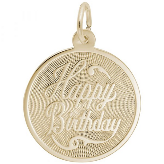 A round pendant from Rembrandt Charms, named the "Happy Birthday Disc," crafted from 14k yellow gold with a textured surface and elegantly engraved with "Happy Birthday" in cursive font. This charming piece features a small loop at the top for easy attachment to a chain or bracelet.