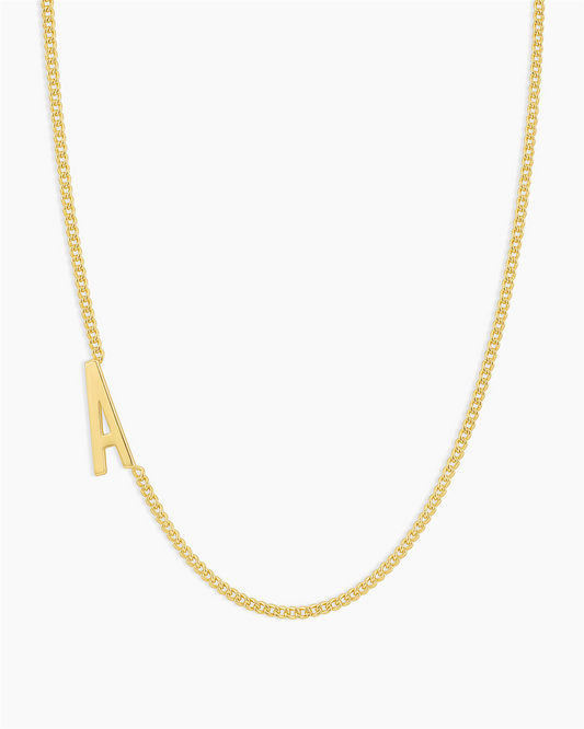 The Gorjana Wilder Alphabet Necklace - A features an 18k gold plated capital letter "A" pendant displayed against a plain white background.