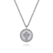Introducing the Gabriel & Co 925 Sterling Silver Bujukan Diamond Cross Pendant Necklace. This exquisite piece from the Bujukan Collection features a round pendant with a beaded edge design, adorned with an engraved diamond cross at its center and small sparkling stones. The necklace includes a simple yet elegant silver link chain, all beautifully showcased against a white background.