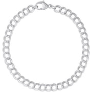 The Rembrandt Charms Charm Bracelet 7 Inch in sterling silver features interlocking round links and a lobster clasp. This simple and elegant design is perfect for both casual and formal occasions. Measuring 7 inches in length, the bracelet is showcased on a plain white background.