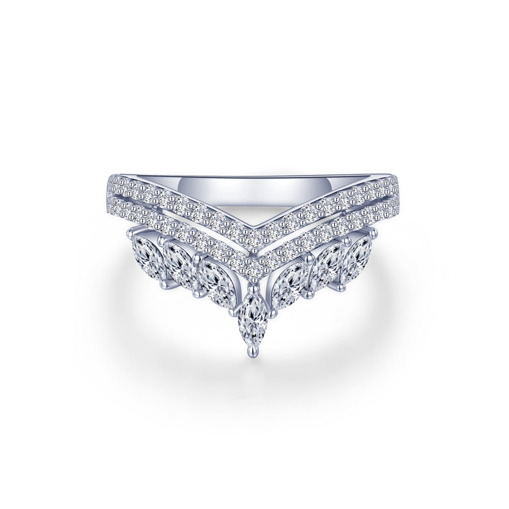 The CROWN RING 07 by Lafonn is a sparkling silver ring highlighting a distinct V-shaped design. It features multiple small round diamonds arranged along the V shape and on the lower section, creating an elegant and intricate pattern against a plain white background.