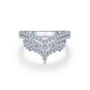 The CROWN RING 07 by Lafonn is a sparkling silver ring highlighting a distinct V-shaped design. It features multiple small round diamonds arranged along the V shape and on the lower section, creating an elegant and intricate pattern against a plain white background.