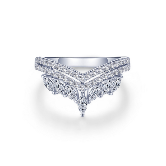 The CROWN RING 07 by Lafonn is a sparkling silver ring highlighting a distinct V-shaped design. It features multiple small round diamonds arranged along the V shape and on the lower section, creating an elegant and intricate pattern against a plain white background.