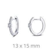 Lafonn's 13 mm x 15 mm Oval Huggie Hoop Earrings feature a pair of small hoops, each adorned with tiny, sparkling stones along one half. Displayed on a white background, these elegant earrings showcase their precise dimensions in subtle grey text below them.