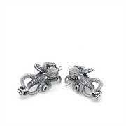 Kabana SS Octopus Earrings, with detailed tentacles and a slightly antique finish, are displayed on a white background—perfect for adding marine elegance to your style.