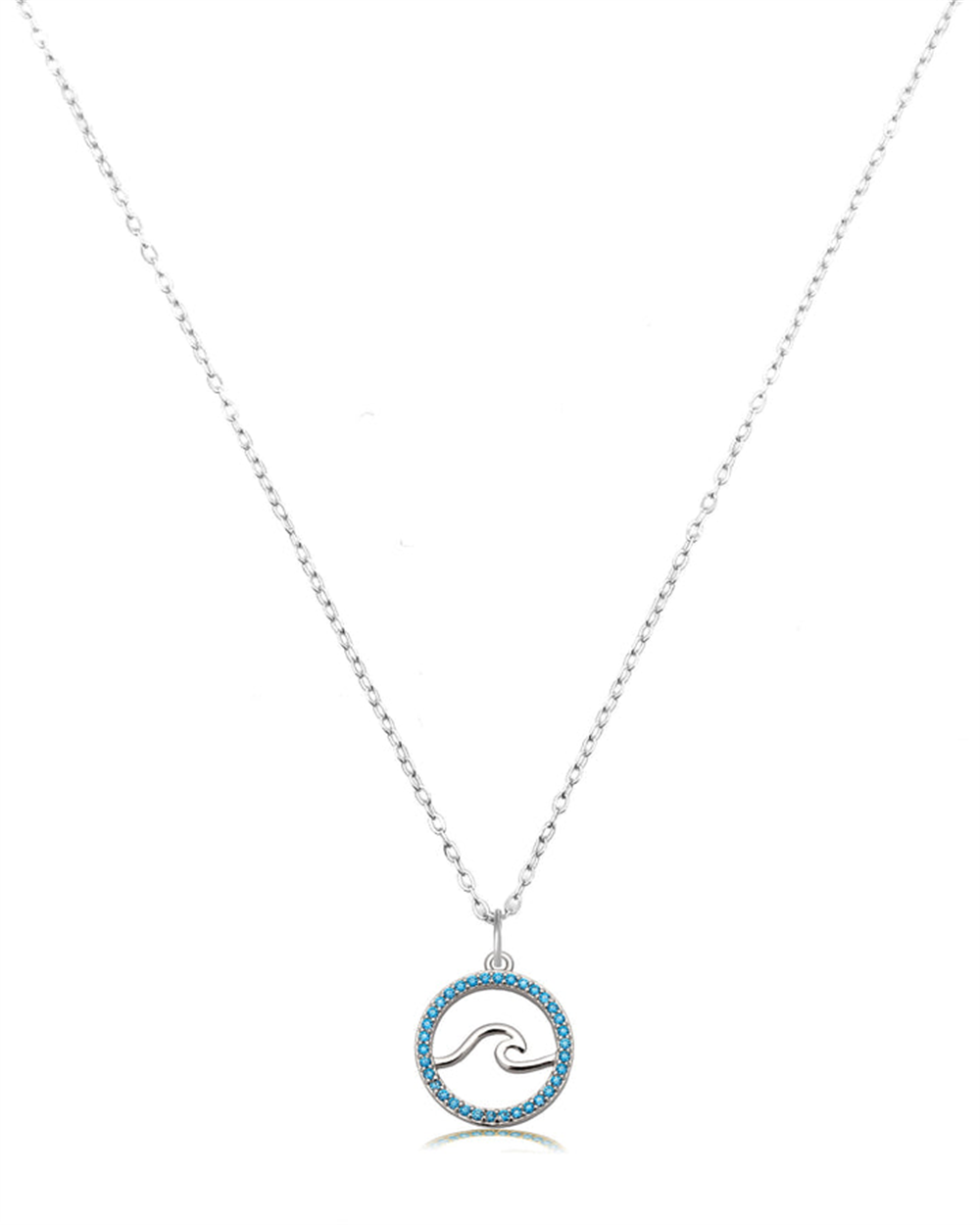 The Serenity Wave Sterling Silver Charm Necklace by T Jazelle features a round pendant with the Serenity Wave design, outlined in silver and bordered by blue stones, displayed on a delicate chain against a white background.
