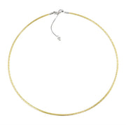 The 14K Reversible Omega Chain with Rose and Yellow Gold by Bellarri forms a perfect circle and features an elegant, delicate design. It includes a small, adjustable clasp with an additional chain extension, allowing length customization from 17" to 19". This necklace embodies timeless beauty with its simple yet sophisticated style.