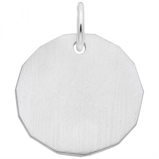 The Plain Tag Charm by Rembrandt Charms is a sterling silver, flat, round pendant with smooth edges and a small loop at the top for attaching to a chain. The surface of this simple and minimalist charm appears slightly textured.