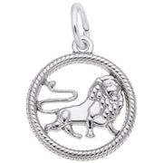 Introducing the Leo Charm / Sterling Silver by Rembrandt Charms. This exquisite round pendant showcases a detailed lion design at its center, encircled by a circular border with a distinctive rope-like texture. A small loop at the top allows for easy attachment to any chain. Ideal for representing the Leo Zodiac sign, this charm features a proud lion in a walking stance.