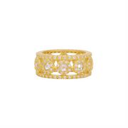 The Freida Rothman Kaleidoscope Cutout Cigar Band Ring (size 7) features intricate circular cutout designs and multiple small lab-created diamond simulants in matte gold, displayed on a plain white background.