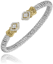 An Alwand Vahan Jewelry bracelet crafted from 14k gold and sterling silver features intricate beading and a flexible 4 mm band design. It includes two ornate clasps facing each other, each adorned with diamond-shaped embellishments accented with 0.32 carats of small, sparkling stones.