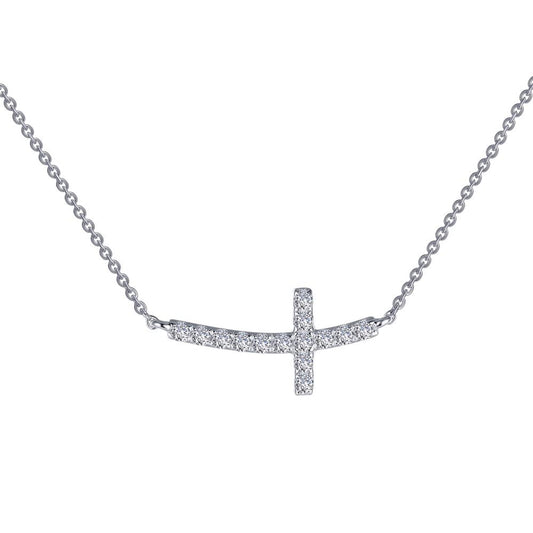 The Lafonn Sideways Curved Cross Necklace is a delicate silver piece showcasing a horizontally oriented, curved cross pendant encrusted with small, sparkling diamonds. The simple cable style chain enhances the elegant and modern design of this exquisite accessory.