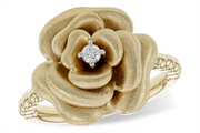 The Allison Kaufman 14k Yellow Gold Rose Ring showcases a beautifully textured rose-shaped design with a single round diamond at its center, all set on an intricately detailed gold band.