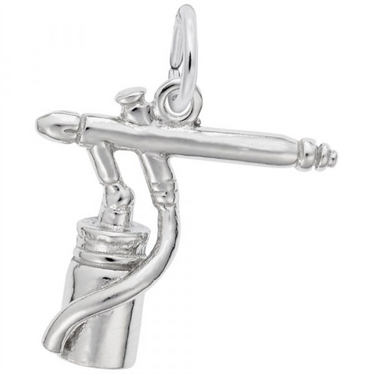 The Rembrandt Charms Airbrush Charm in sterling silver presents a meticulously detailed depiction of an airbrush tool, complete with a cylindrical cup at the bottom and a loop at the top for easy attachment to a chain or bracelet, making it an exquisite piece of artistic jewelry.