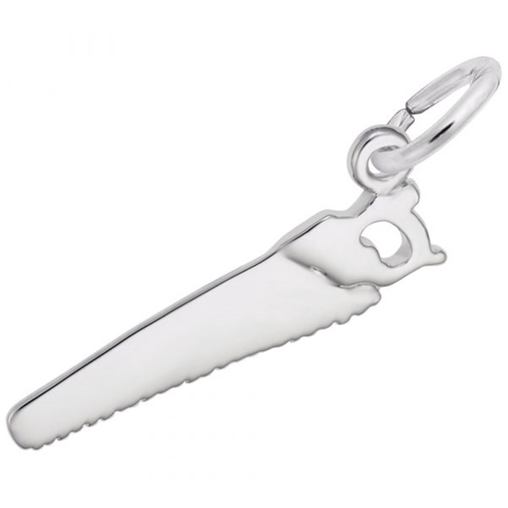 The Hand Saw Charm by Rembrandt Charms is crafted from sterling silver, featuring a detailed handle and a serrated edge to represent the saw teeth. It hangs from a circular loop, designed to be attached to a necklace or bracelet.