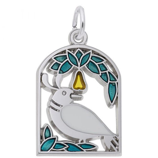 The "A Partridge in a Pear Tree" charm by Rembrandt Charms is crafted from sterling silver and shaped like an arched window, featuring a white bird perched on a branch. Adorned with blue and green enamel leaves, the charm also includes a small yellow pear above the bird.