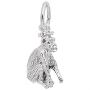 The Rembrandt Charms Chimpanzee Charm is crafted in sterling silver, featuring a seated monkey with textured fur and facial details, and includes a circular loop for attaching to bracelets or necklaces.