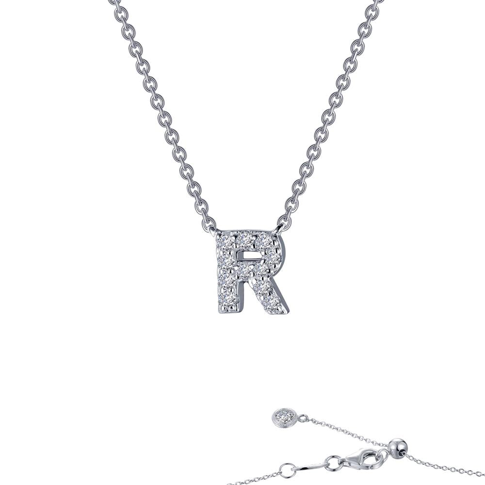 The Lafonn Letter R Pendant Necklace boasts a beautifully crafted pendant in the shape of the letter "R," adorned with Lafonn's signature Lassaire simulated diamonds. Constructed from sterling silver bonded with platinum, it features a linked chain with an adjustable clasp and delicate small circular charm accents at the end.
