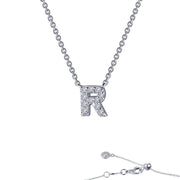 The Lafonn Letter R Pendant Necklace boasts a beautifully crafted pendant in the shape of the letter "R," adorned with Lafonn's signature Lassaire simulated diamonds. Constructed from sterling silver bonded with platinum, it features a linked chain with an adjustable clasp and delicate small circular charm accents at the end.