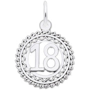 The Rembrandt Charms Number 18 Charm in sterling silver features a round design with a zigzag pattern adorning the edges and the number "18" boldly displayed in the center. A small loop is included at the top, making it easy to attach to a chain or bracelet.