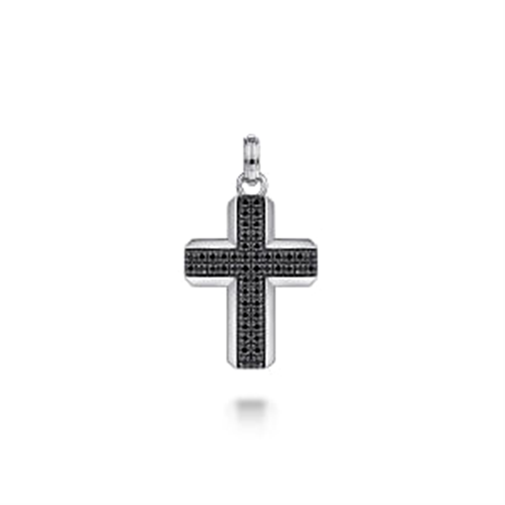 The Gabriel & Co Sterling Silver and Black Spinel Cross Pendant showcases a 925 sterling silver construction adorned with small black spinels. It features a textured design in the center and includes a small loop at the top for attaching to a chain. The plain white background highlights the pendant's intricate details.