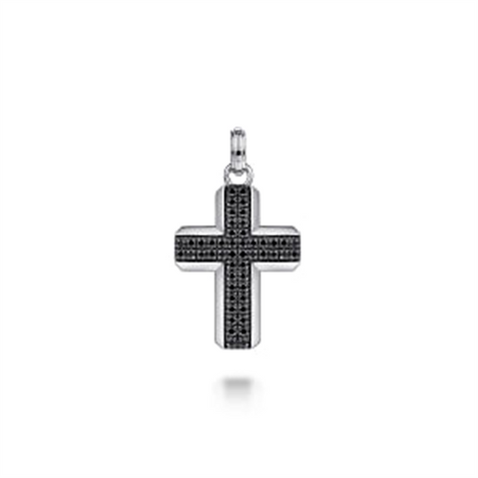 The Gabriel & Co Sterling Silver and Black Spinel Cross Pendant showcases a 925 sterling silver construction adorned with small black spinels. It features a textured design in the center and includes a small loop at the top for attaching to a chain. The plain white background highlights the pendant's intricate details.
