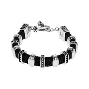 The King Baby Stingray Bracelet with Silver Detail is a stylish black woven bracelet with metal accents—an ideal 20th anniversary gift.