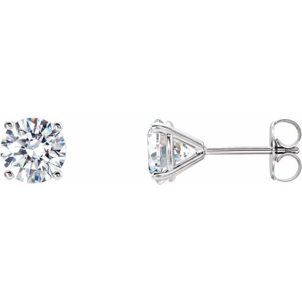 Simply Diamonds' 14KW 1/2 CTTW Lab Grown Diamond Studs feature round-cut lab grown diamonds set in prong settings. The earrings boast a simple, elegant design with prominently displayed diamonds. One earring is shown from the front, while the other is shown from the side to highlight the setting and post.