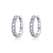 A pair of elegant Interlocking Circles Hoops by Lafonn, designed in the shape of half-hoops, featuring a continuous row of sparkling white gemstones set in a twisted pattern. The jewelry showcases interlocking circles for added sophistication and has a smooth finish with a clasp mechanism for secure wear.