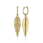 The 14K Yellow Plain Gold Huggie Drop Leaf Earrings (Serial No: S1733249) from Gabriel & Co. feature exquisite beaded leaf-shaped pendants that dangle gracefully. The hoops themselves also showcase a delicate beaded design, adding to the overall elegant and intricate appearance, making these earrings perfect for any occasion.